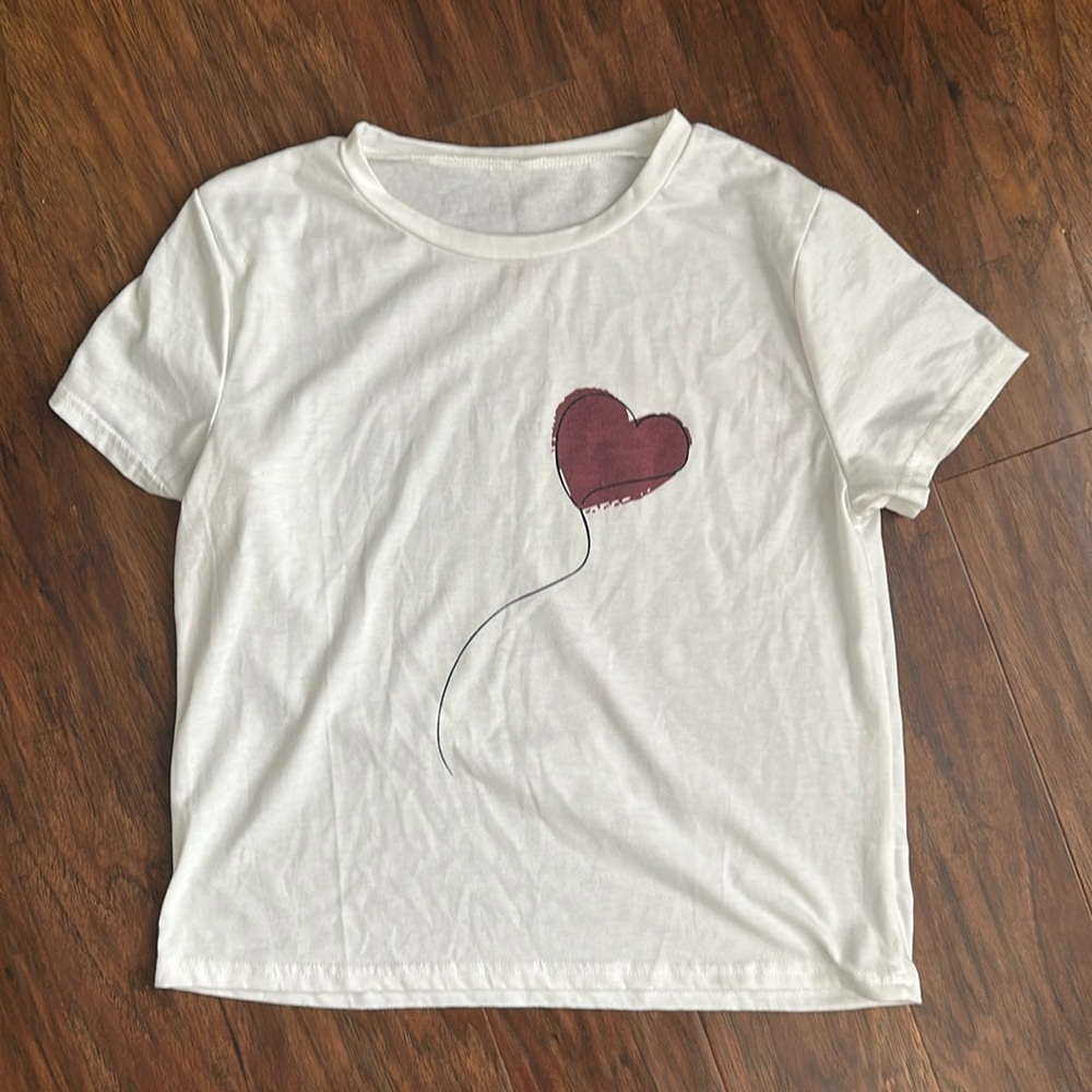 Cropped heart tee.